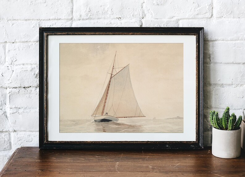A framed black and white illustration of a sailboat with a white sail on a calm sea.