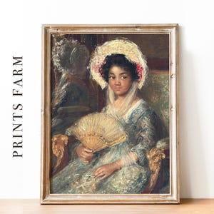 Framed painting of a woman in a bonnet holding a fan, set against a textured background. The style is classical and elegant with soft tones.