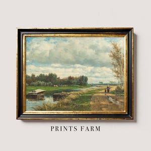 A framed oil painting depicting a rural landscape with a cloudy sky, a winding path, and two figures walking towards a small village in the distance.