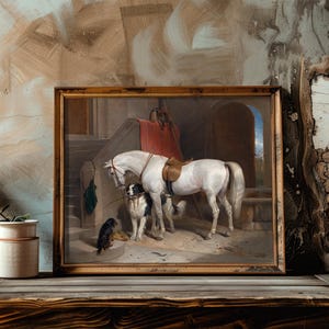 A framed painting of a white horse with two dogs stands against a textured wall. A rustic plant and ceramic pot sit on a wooden table, conveying a vintage vibe.