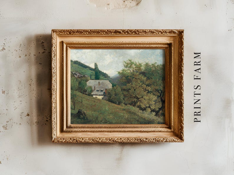 Framed landscape painting of a rural scene with a house, trees, and hills, set against a textured wall. Text "PRINTS FARM" is on the right.