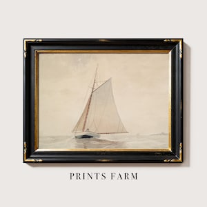 Framed painting of a sailboat with large sails on calm waters. The muted color palette and serene sky evoke a sense of tranquility and nostalgia.