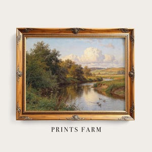 May include: A framed landscape painting featuring a river scene with ducks, trees, and a cloudy sky. The painting is in a gold ornate frame. The text "PRINTS FARM" is at the bottom of the image.