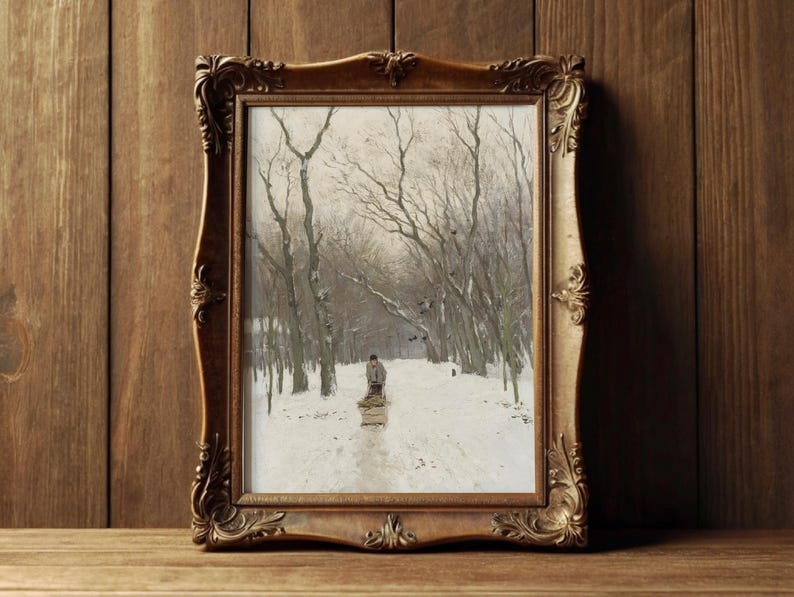 Framed painting of a snowy path through leafless trees, with a person pulling a sled. The scene conveys a serene, wintery atmosphere.