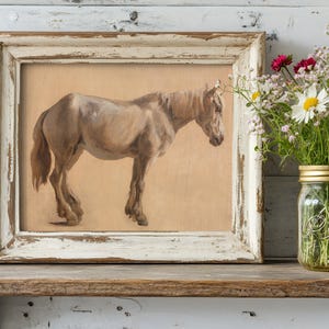 A rustic painting of a brown horse in a weathered frame sits on a wooden shelf. Beside it, a mason jar holds vibrant wildflowers, creating a cozy, vintage feel.