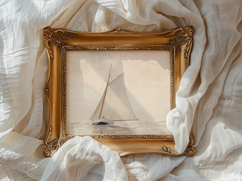 Ornate gold-framed painting of a sailboat on serene waters, draped in white fabric. Evokes a tranquil, vintage maritime feel.