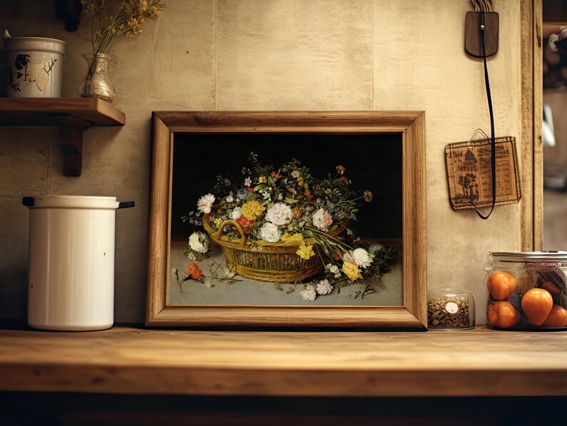 Framed still-life painting of flowers in a basket on a rustic kitchen shelf. Nearby are a jar of oranges, a white canister, and vintage decor. Cozy and nostalgic.