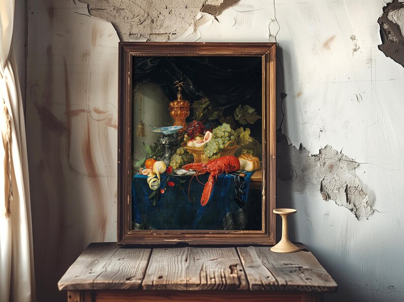 A framed painting of a lavish still life featuring fruits, a lobster, and ornate goblets on a table with a blue cloth. The painting leans against a peeling, rustic wall, creating a contrast between elegance and decay.