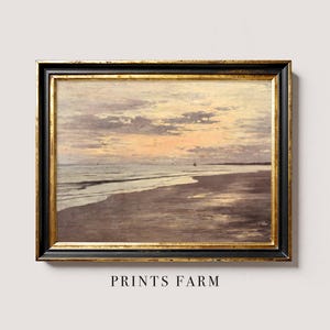 Framed painting of a serene sunset over a beach, with soft pastel clouds and reflections on wet sand. Text below reads "Prints Farm." Warm and calming tone.