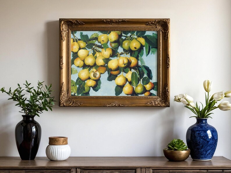 Framed painting of yellow pears hangs on a wall above a wooden console. Vases with green plants and white tulips add elegance and color.