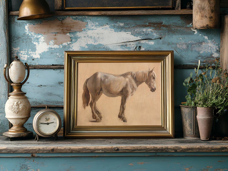 A framed painting of a brown horse stands on a rustic shelf, flanked by an antique lamp, clock, and potted plants against weathered blue wood.