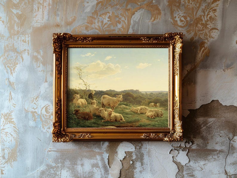 A framed painting depicting sheep grazing on a lush meadow under a blue sky with fluffy clouds, set against a textured, vintage wall.