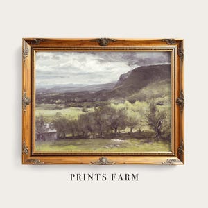 Framed landscape painting of a farm. Features rolling hills, cloudy sky, and lush green fields. The scene evokes a calm, serene atmosphere.