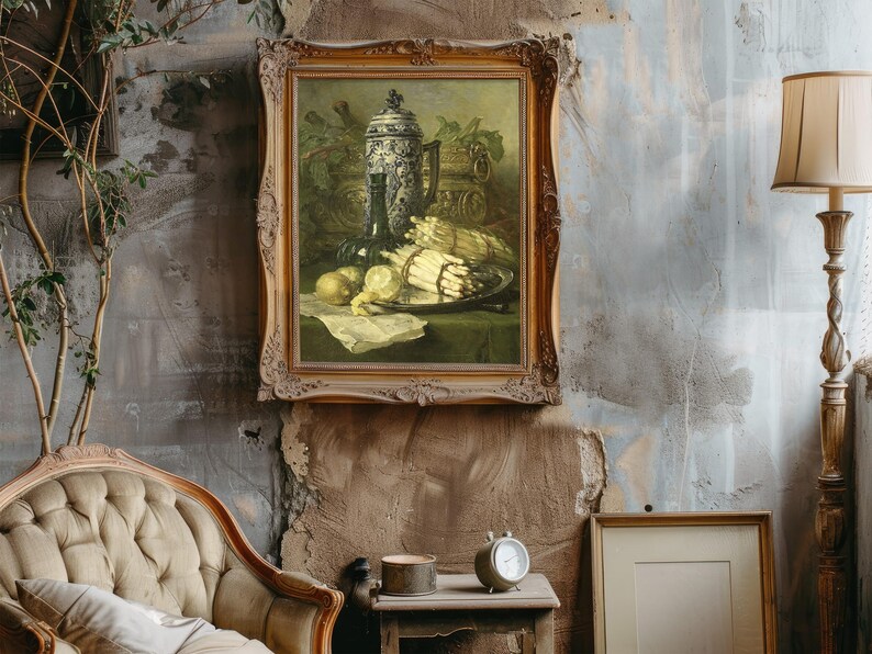 A rustic room features a vintage armchair, a potted plant, and a tall lamp. A classical still-life painting with fruits and a jug hangs on the textured wall.