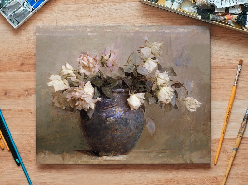 A painting of a bouquet of white roses in a dark blue vase. The roses are wilting and have a faded, vintage look. The background is a muted brown.