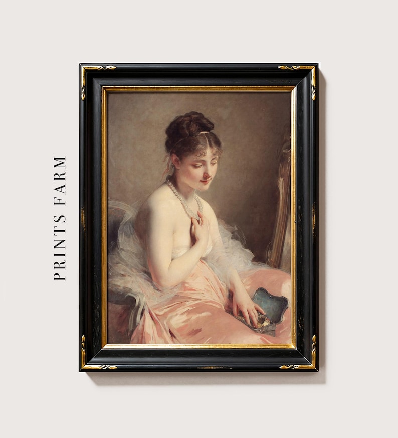 A vintage portrait of a seated woman in a pink dress, holding a blue fan, looking down with a serene expression. The image is framed in black and gold.