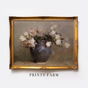 A delicate still life of faded white roses in a dark blue vase, capturing a moment of quiet beauty. The soft light and muted colors evoke a sense of tranquility.