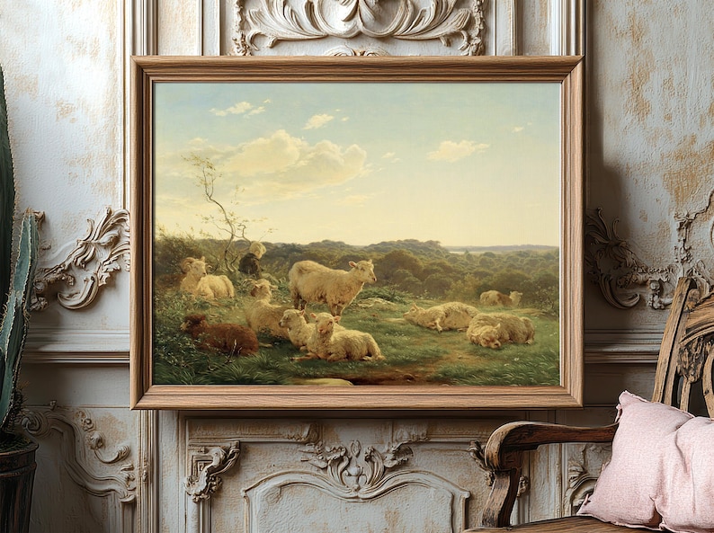 A serene painting of sheep grazing on a lush hillside, framed in wood, hangs on an ornate wall, exuding a peaceful, pastoral ambiance.