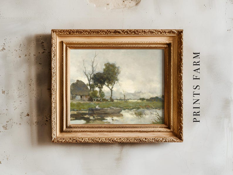 Framed landscape painting of a tranquil countryside with a cottage, trees, and a serene pond. The frame is ornate, and "PRINTS FARM" is written beside it.