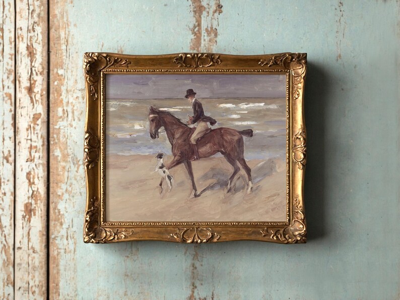 Painting of a rider on a horse by the sea, accompanied by a dog, in an ornate gold frame against a distressed wooden wall. Tranquil and nostalgic.