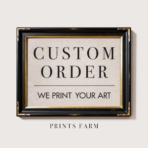 May include: A rectangular black frame with gold inner trim containing a beige fabric insert. The text reads CUSTOM ORDER, WE PRINT YOUR ART, and PRINTS FARM. The frame features decorative gold accents on the corners and edges of the black border.