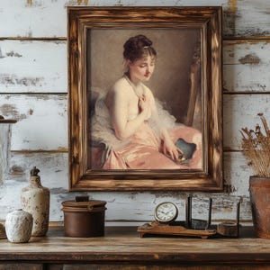 A vintage painting of a seated woman in a pink dress, framed in wood, hangs on a rustic white wall. Nearby are a candle, jars, clock, and dried plants. Cozy and nostalgic mood.