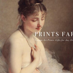Framed portrait of a woman in a pink dress sits on a fluffy white rug. Beside it, a white vase holds dried pampas grass, creating a serene, elegant scene.