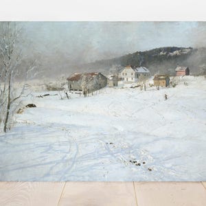 A serene winter landscape painting depicts snow-covered fields and scattered farmhouses under a pale sky, evoking a calm and tranquil mood.