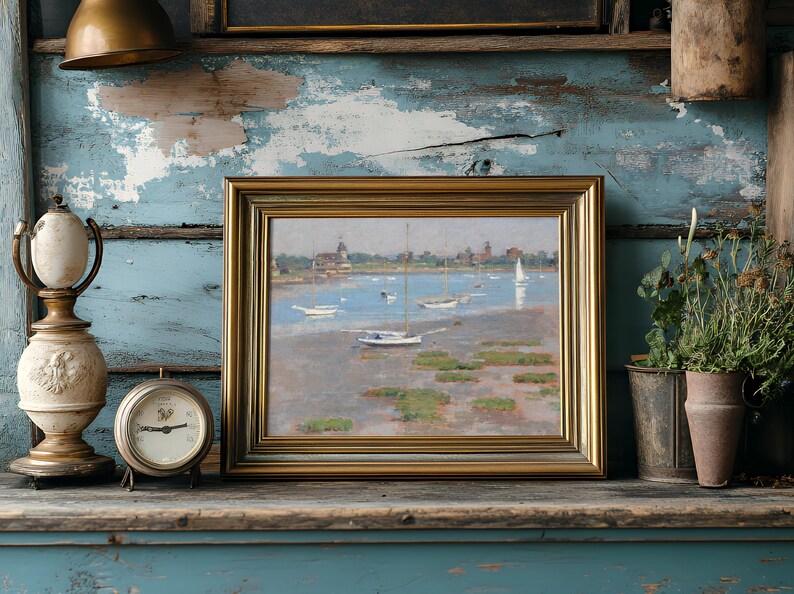 A framed landscape painting of sailboats on a serene blue lake is placed on a rustic shelf. Surrounding it are a vintage clock, a decorative lamp, and potted plants, set against a distressed blue wooden wall.