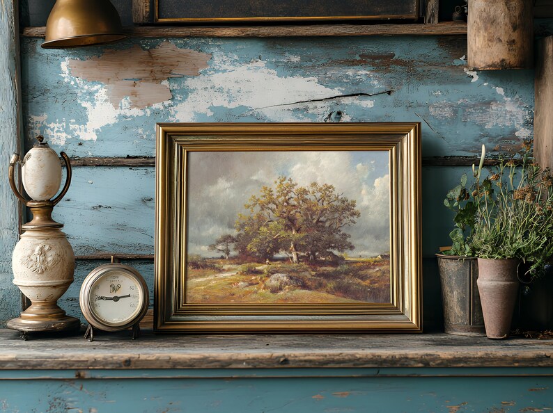A rustic scene on a weathered blue shelf features an ornate lamp, a vintage clock, and a framed landscape painting with lush trees. Adjacent potted plants add a natural touch.