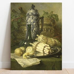 Still life painting of white asparagus on a plate, a lemon, a green bottle, and an ornate blue ceramic jug. The setting exudes a classic, elegant tone.