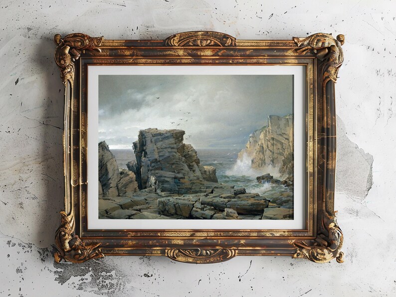 A framed painting of a rocky cliff by the sea on a textured wall. Waves crash against the rocks under a cloudy sky, creating a dramatic, moody scene.