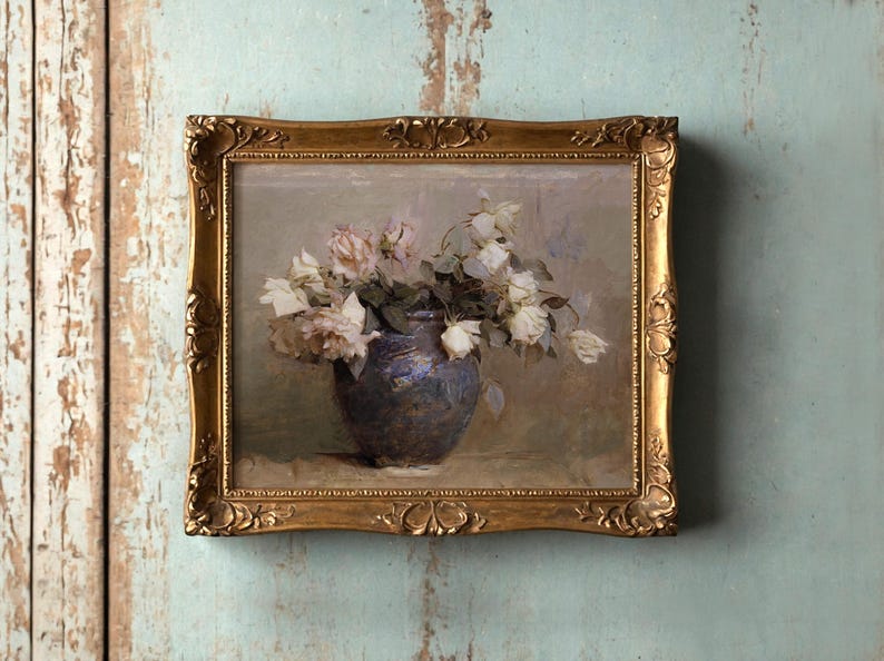 A vintage painting of pale roses in a blue vase, framed in ornate gold, hangs on a distressed teal wall, evoking a calm, nostalgic mood.