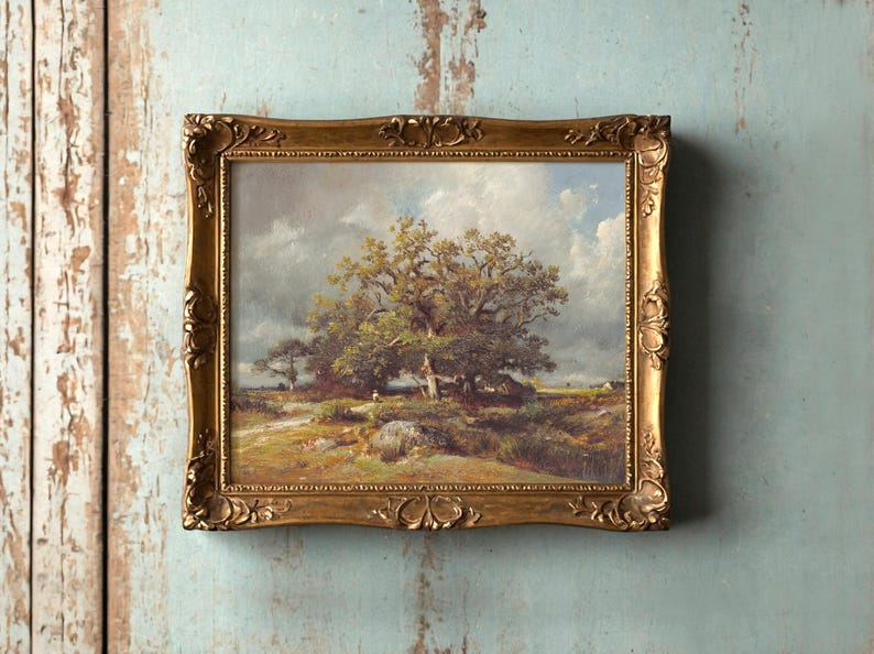 Ornate framed landscape painting on worn, light blue wall. Depicts a large tree under cloudy sky, evoking a peaceful, rustic scene.