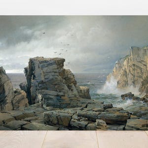 Rocky seascape painting with dark clouds, crashing waves, and jagged cliffs. Birds soar above, conveying a dramatic, serene atmosphere.