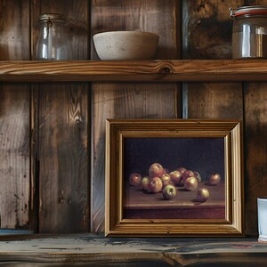 A rustic wooden shelf holds jars, a ceramic bowl, and a framed painting of apples. A clay pot and a mug add a cozy, vintage feel to the scene.
