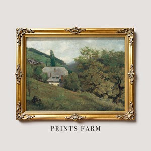 Framed painting of a tranquil rural scene with a farmhouse, lush trees, and rolling hills under a cloudy sky. The gold frame is ornate, adding elegance.
