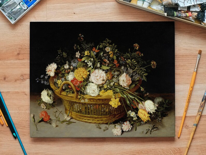 A detailed painting of a wicker basket overflowing with colorful flowers on a wooden table, surrounded by art supplies, evokes a creative, serene ambiance.