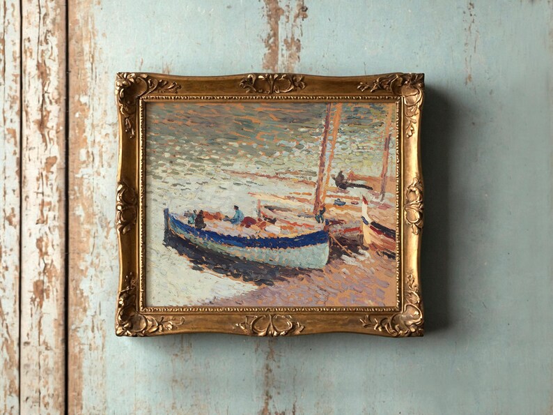 A framed painting of small boats on water with impressionistic brush strokes, in a gold ornate frame against a weathered wooden wall, evoking a serene mood.