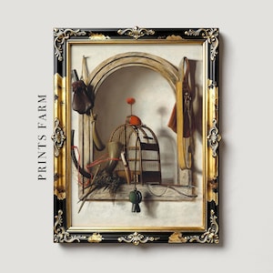 Framed painting features an arched niche with rustic still life objects: a birdcage, saddle, hunting gear, and a stick with an orange pom-pom. The setting evokes a vintage feel.