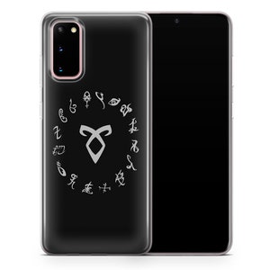 May include: A clear phone case with a black background and a white design. The design features a circle of runes from the book series "The Mortal Instruments" surrounding the symbol of the Institute.