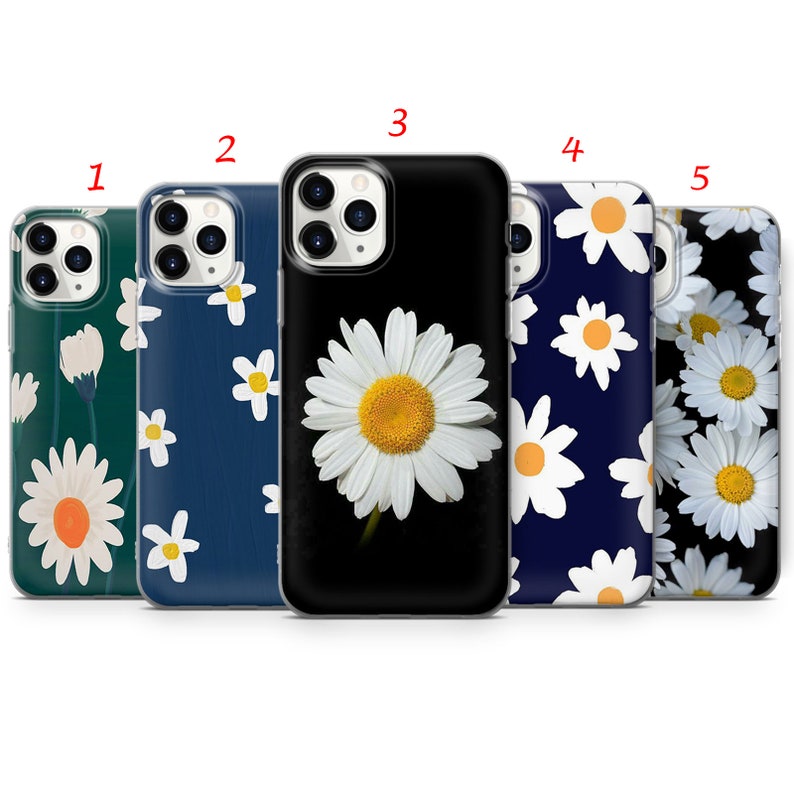May include: Five different phone cases with a daisy flower design. The cases are black, dark blue, light blue, and white with a daisy flower pattern.