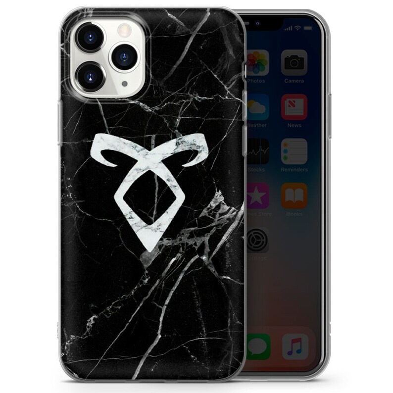 May include: A black and white marble phone case with a white rune symbol. The rune symbol is a white triangle with two curved lines on either side.