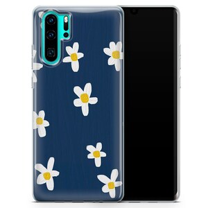 May include: A clear phone case with a dark blue background and a white daisy pattern. The case is designed for a phone with a triple camera lens.