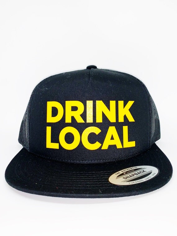 black and gold trucker hat
