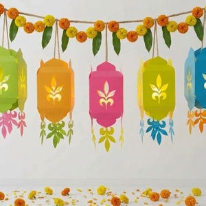 May include: A decorative garland featuring a string of orange and yellow marigold flowers with green leaves, suspending five colorful paper lanterns. Each lantern displays a gold fleur-de-lis cutout and features dangling paper leaf accents.