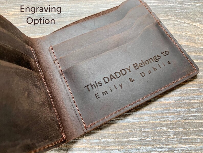 a leather wallet with a name tag on it