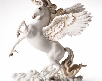 May include: A white ceramic Pegasus statue with outstretched wings, rearing up on its hind legs. The mythical creature has detailed feathering on its wings and is posed on a cloud base. The mane and tail have a light brown color.