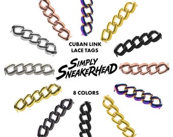May include: An assortment of eight Cuban link lace tags in various colors, including silver, rose gold, gold, black, and iridescent. The text "Cuban Link Lace Tags" and "Simply Sneakerhead" are displayed. The phrase "8 Colors" is also visible.