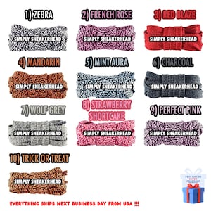 O estilo duplo vibrante completo do tom da corda amarra laços fantásticos coloridos